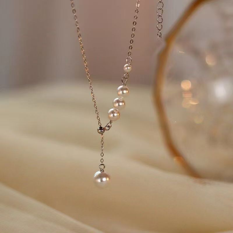 Silver-tone faux pearl tassel pendant necklace