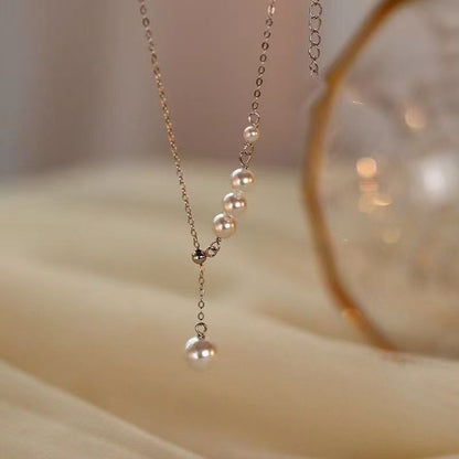 Silver-tone faux pearl tassel pendant necklace
