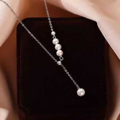 Silver-tone faux pearl tassel pendant necklace