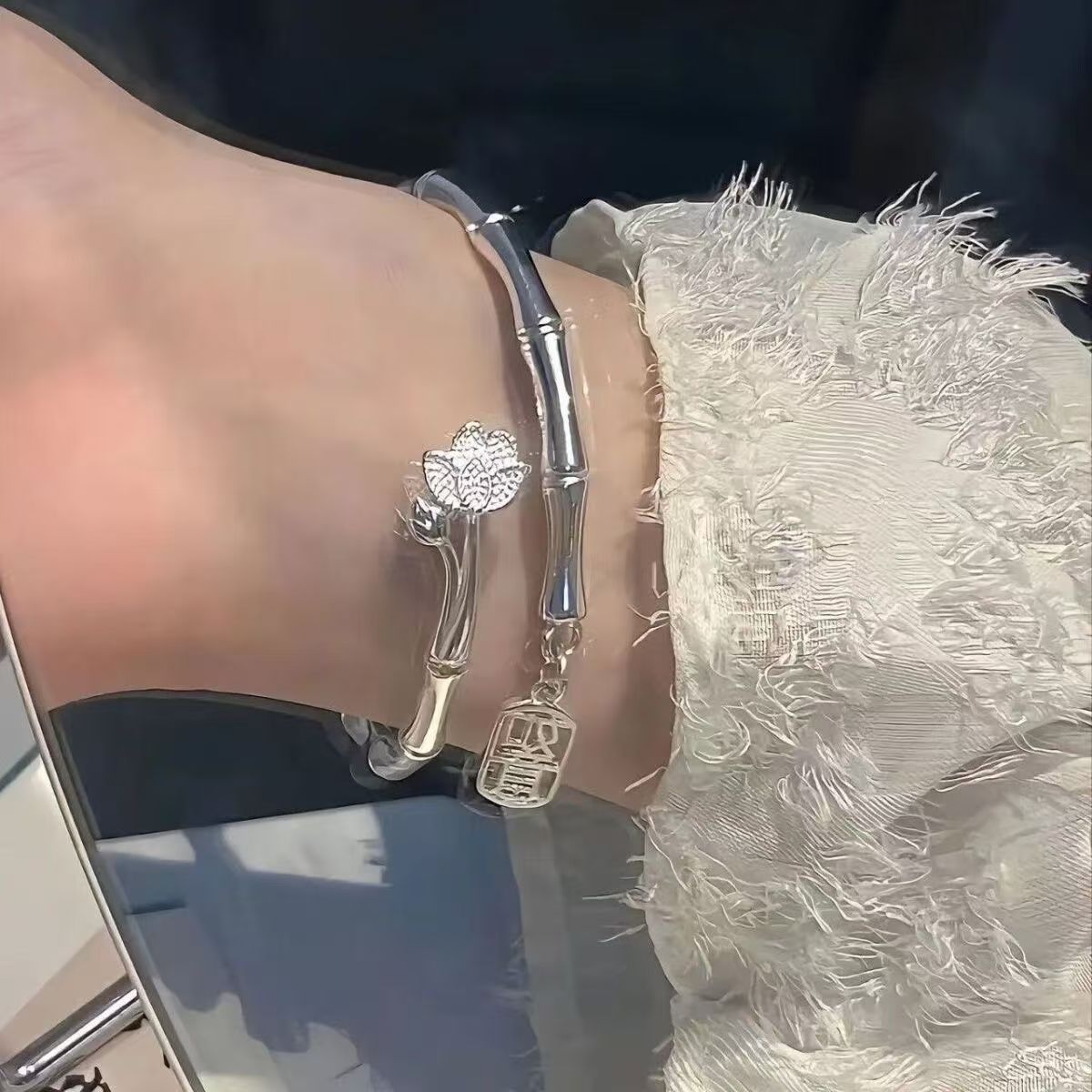 Adjustable silver-tone lotus link cuff bracelet