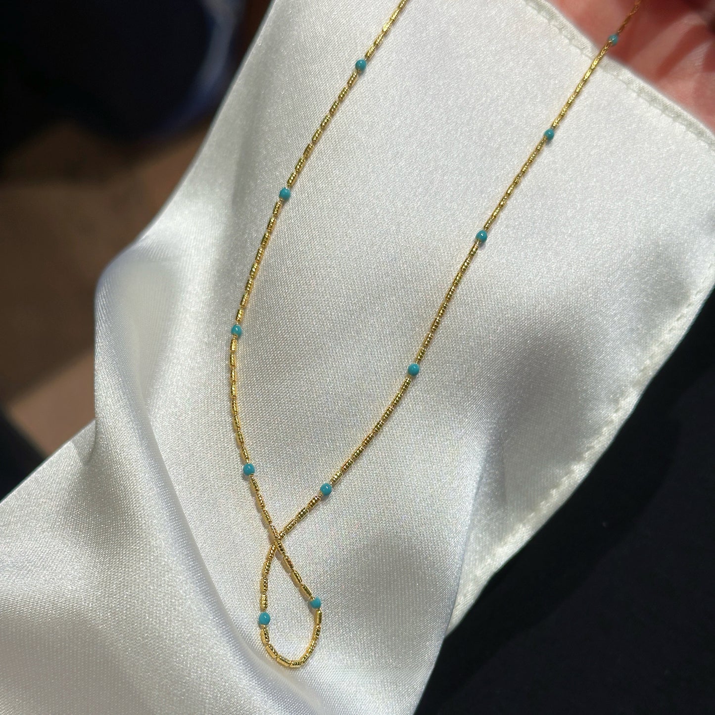 Turquoise-color beaded faux pearl pendant necklace