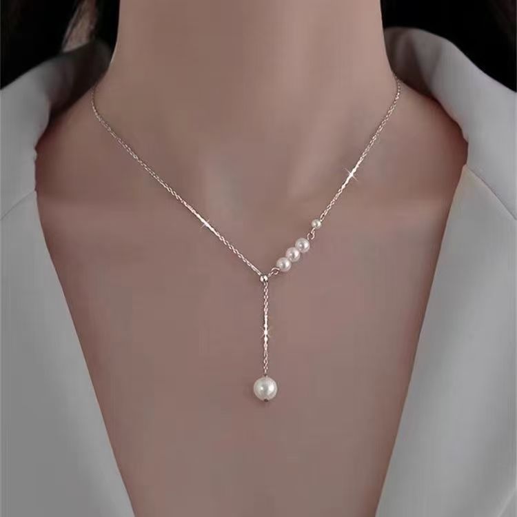 Silver-tone faux pearl tassel pendant necklace