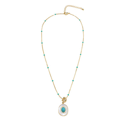 Turquoise-color beaded faux pearl pendant necklace