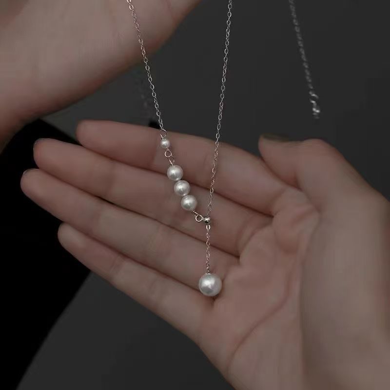 Silver-tone faux pearl tassel pendant necklace
