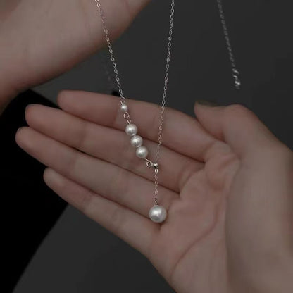Silver-tone faux pearl tassel pendant necklace