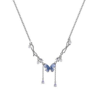 Blue crystal butterfly faux pearl tassel necklace